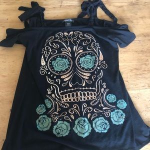 Skull off the shoulder top